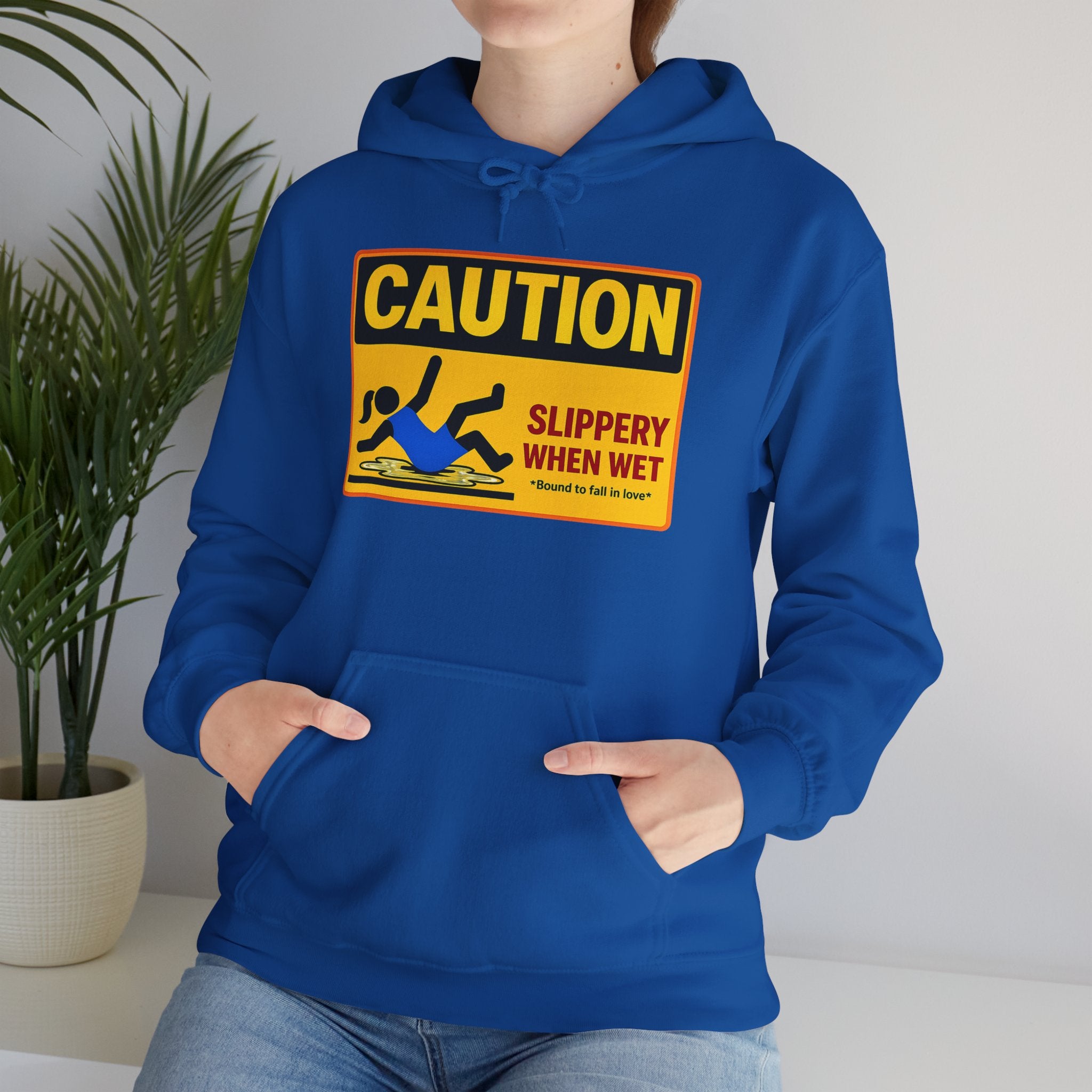 Caution Slippery When Wet Hoodie — Funny Safety Sign Pullover
