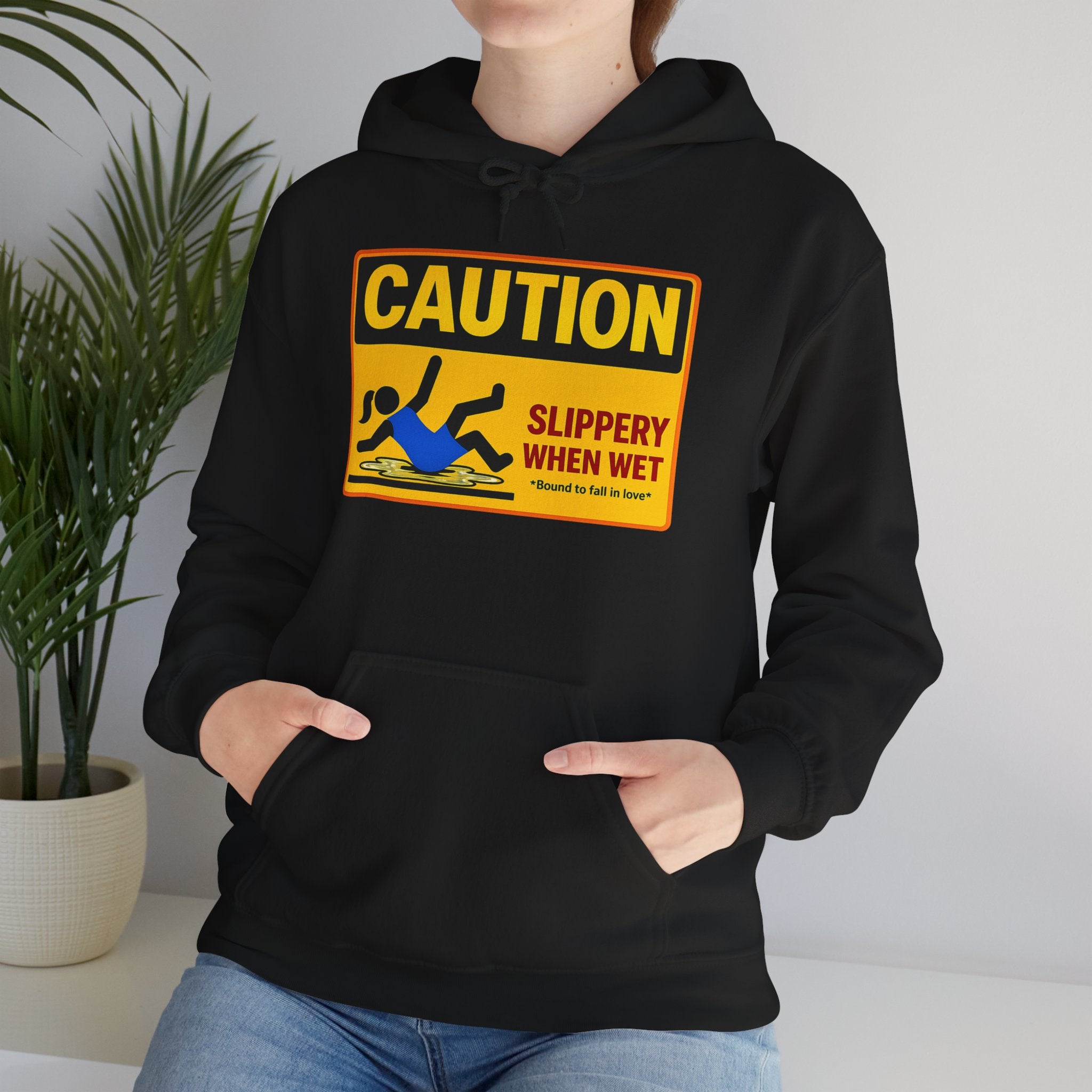 Caution Slippery When Wet Hoodie — Funny Safety Sign Pullover