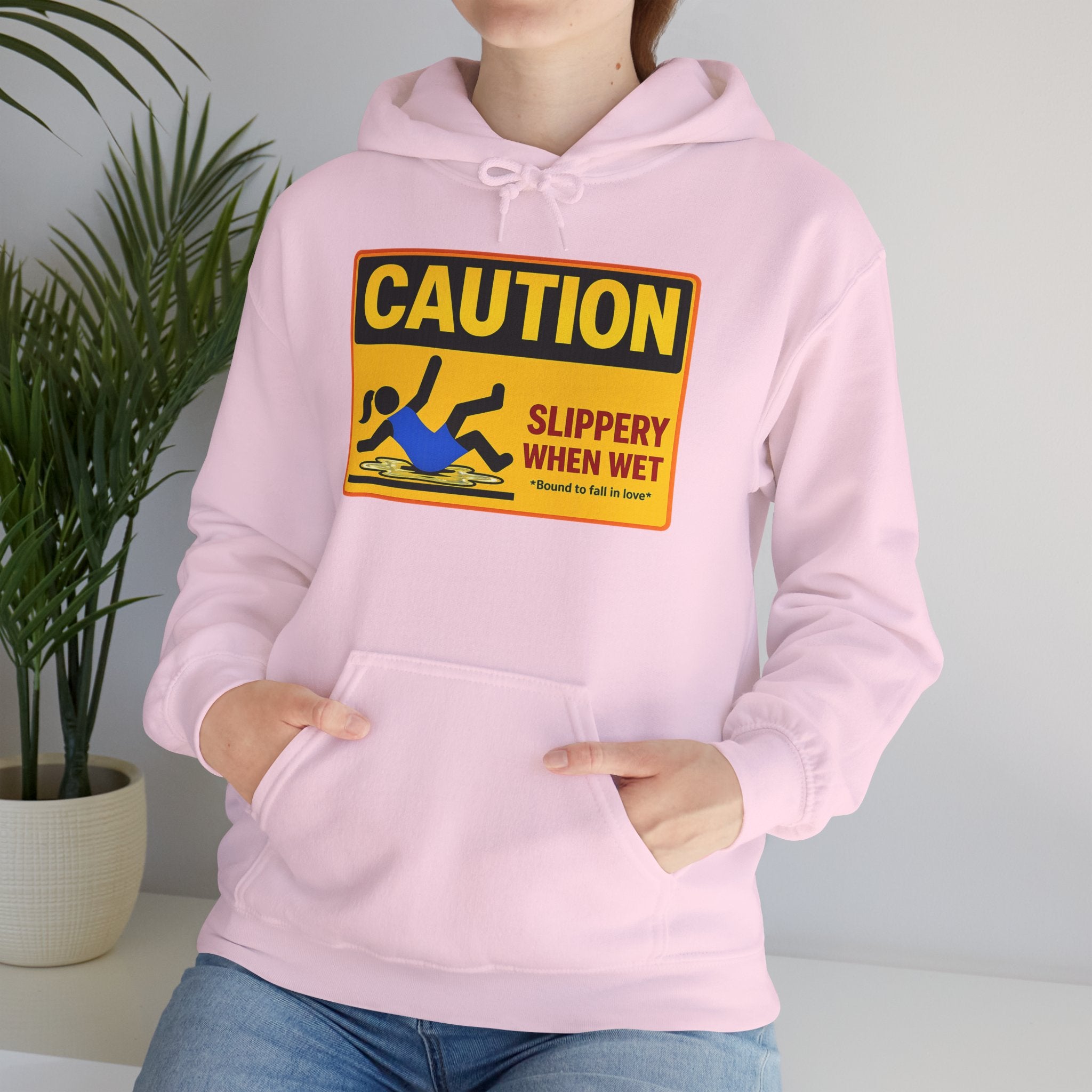 Caution Slippery When Wet Hoodie — Funny Safety Sign Pullover
