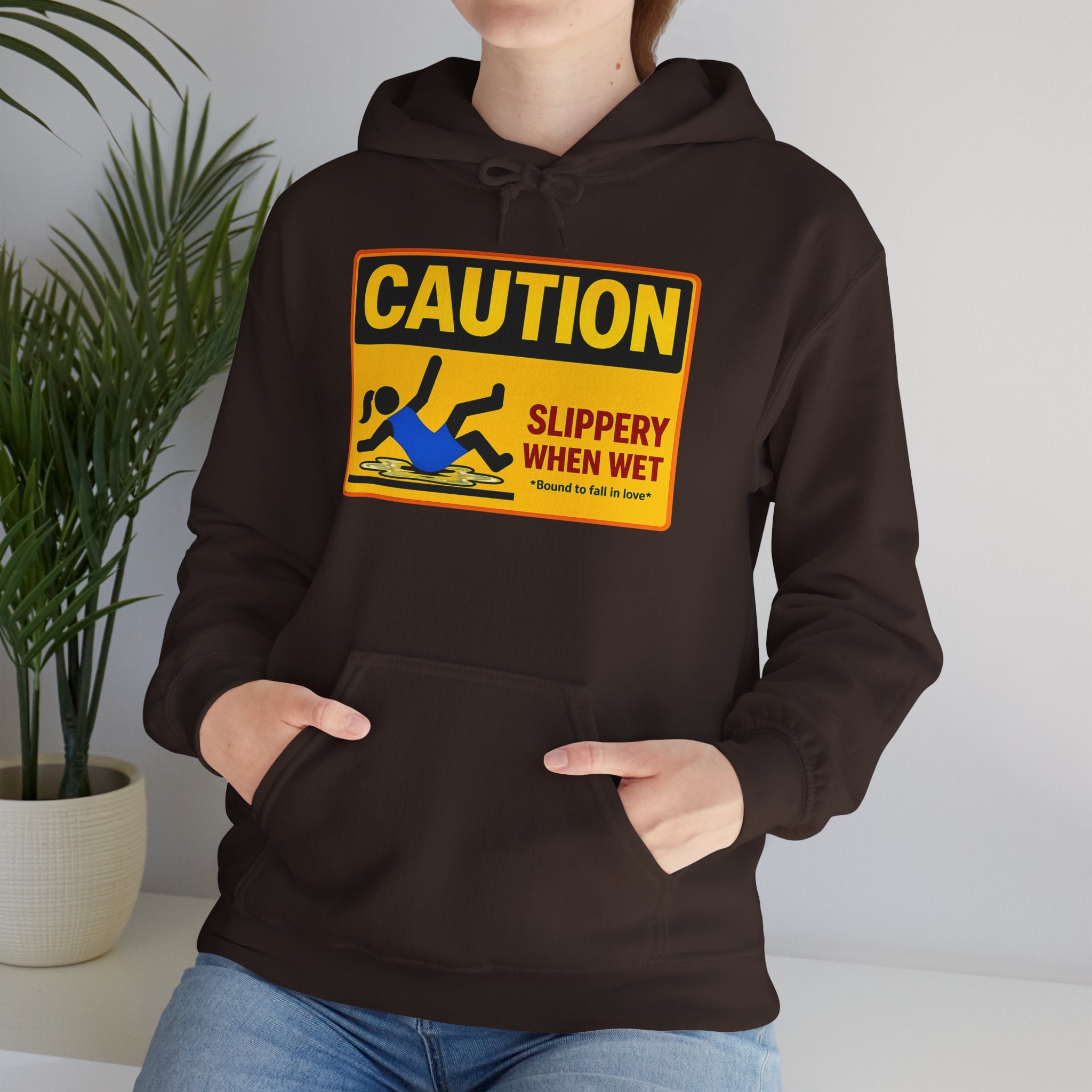 Caution Slippery When Wet Hoodie — Funny Safety Sign Pullover
