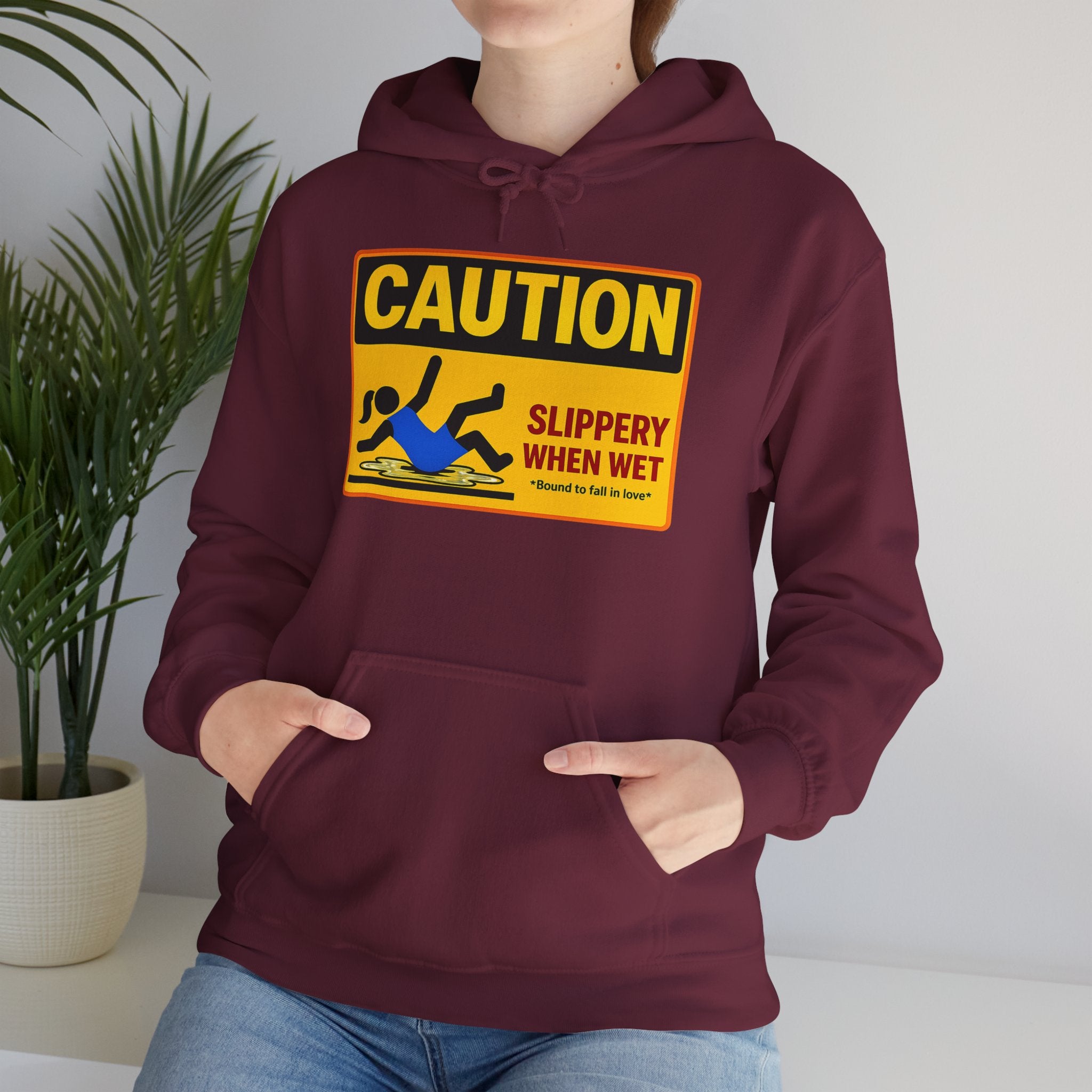 Caution Slippery When Wet Hoodie — Funny Safety Sign Pullover