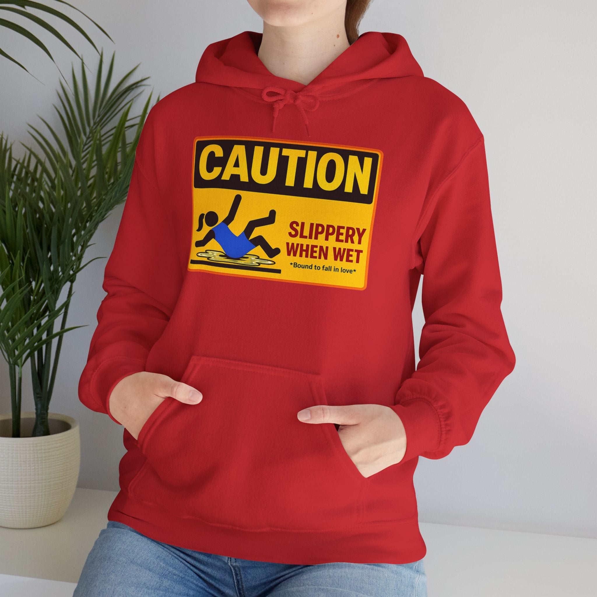 Caution Slippery When Wet Hoodie — Funny Safety Sign Pullover