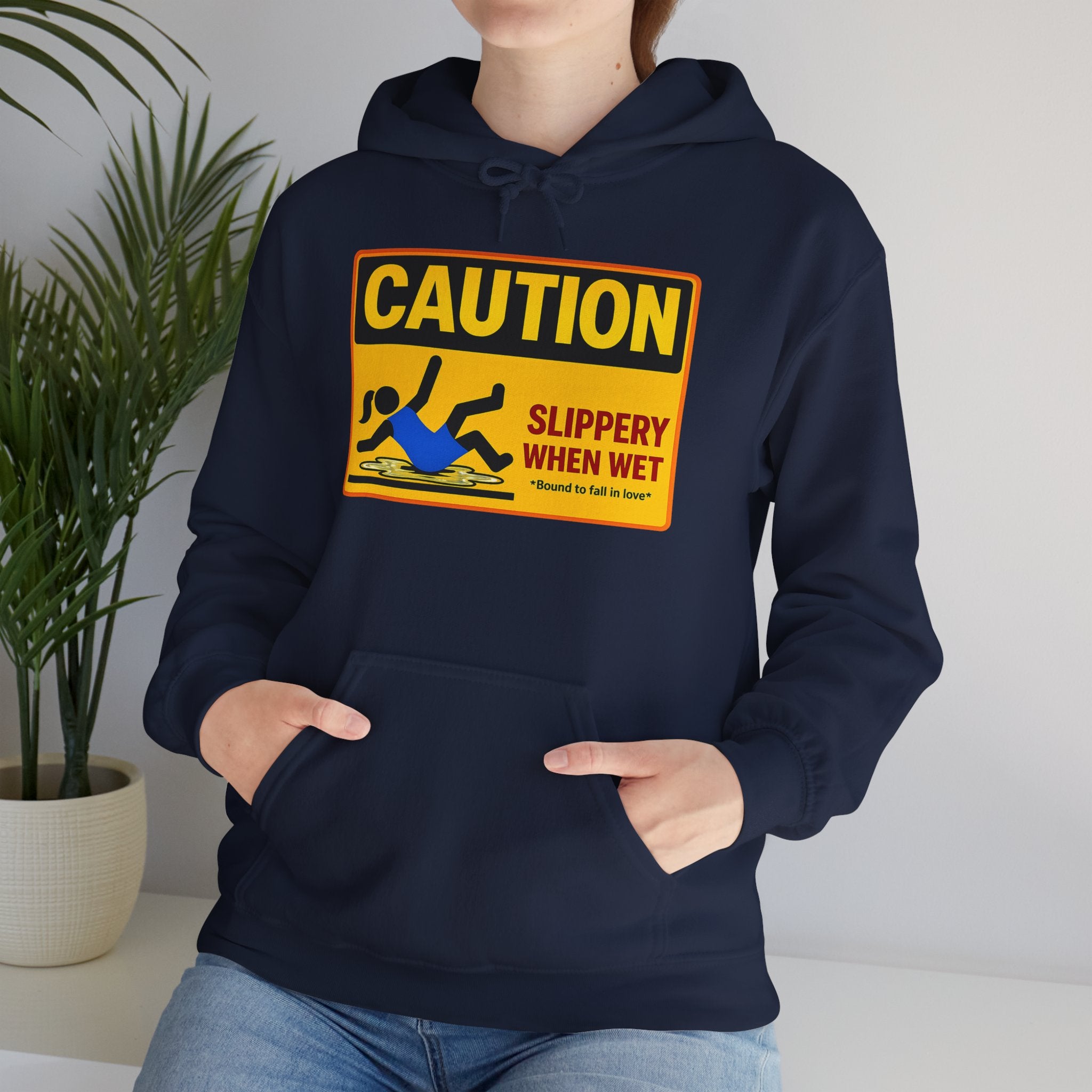 Caution Slippery When Wet Hoodie — Funny Safety Sign Pullover